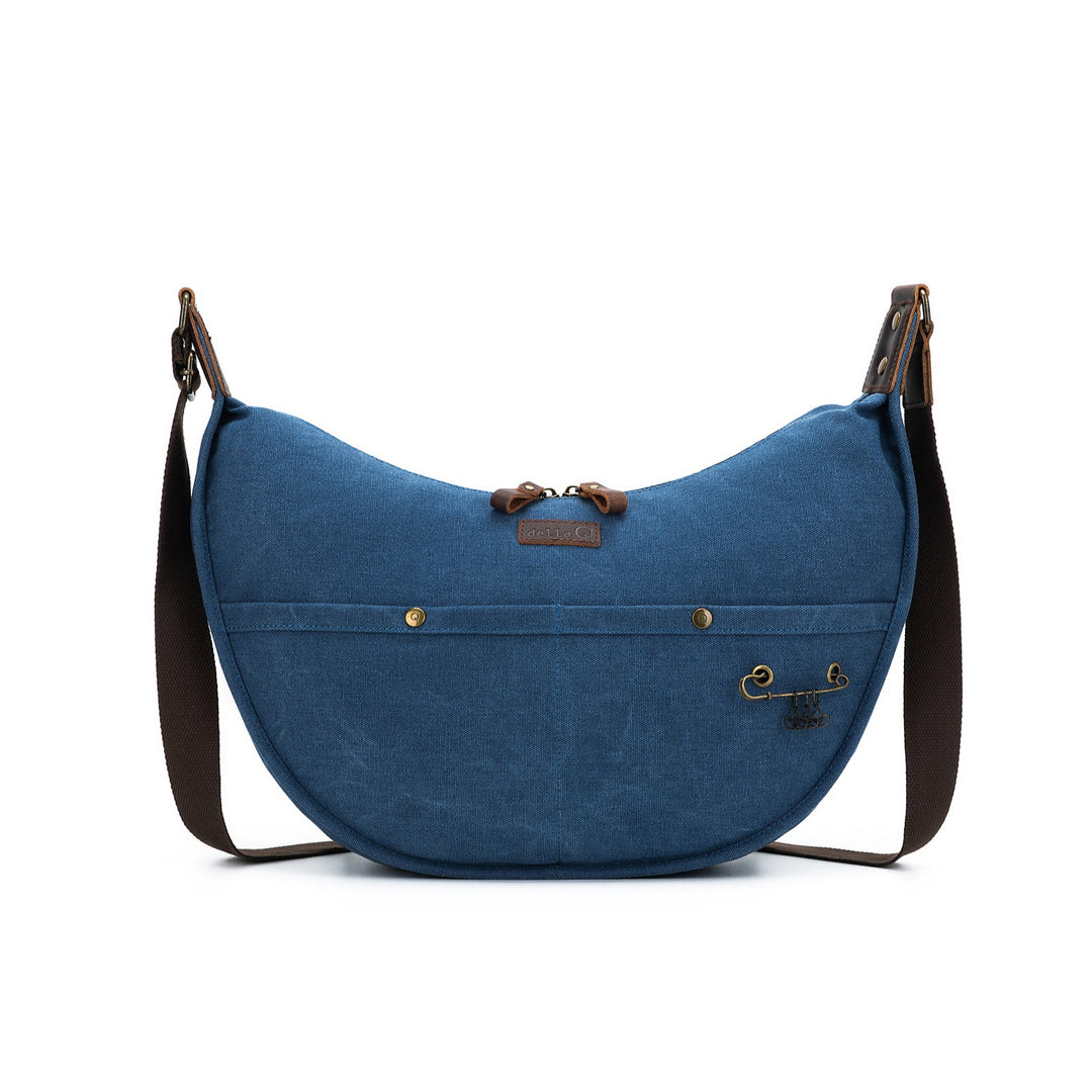 Blue shoulder bag with brown strap on a white background