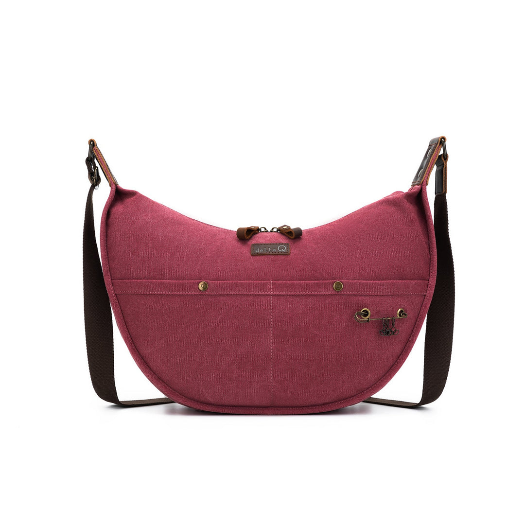 Pink shoulder bag with a strap on a white background