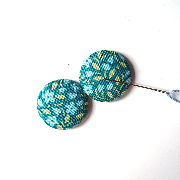 Needle Minder